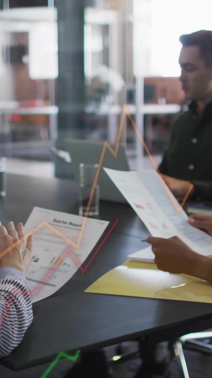 Animation of financial data processing over diverse business people in office