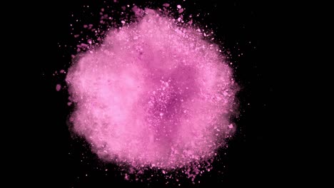 super slow motion of colored powder explosion isolated on dark background.