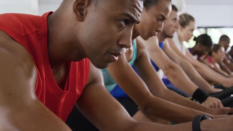 Working-out-on-exercise-bikes-at-a-gym