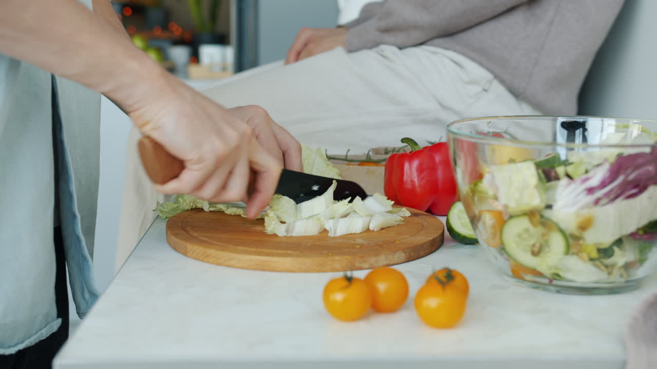 Woman Chopping Vegetables for Salad