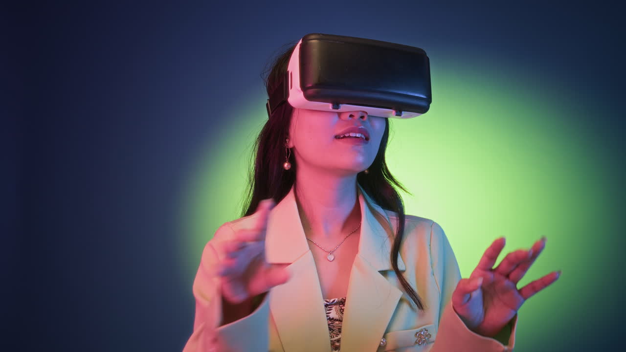 Young Woman Playing Video Game in VR Headset on Neon Background