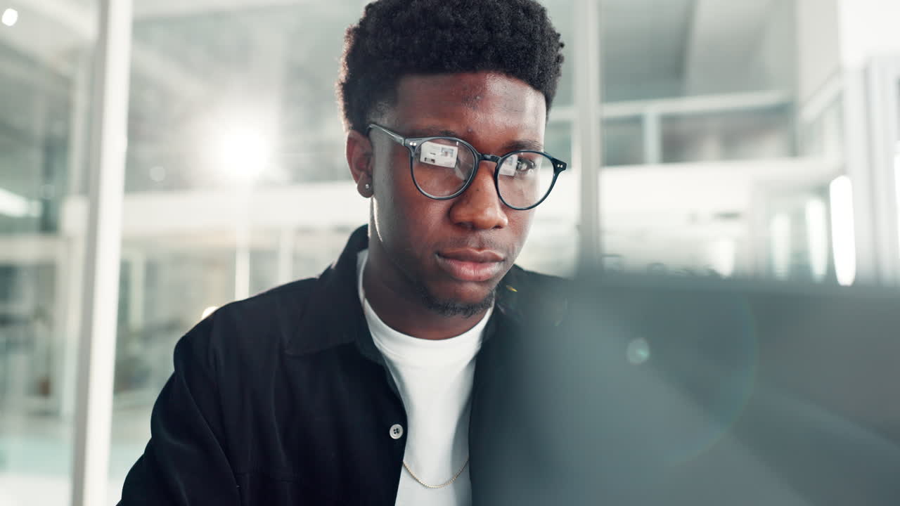 African American Man Working in Office