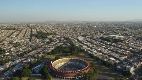 aerial approach to bull fighting stadium in guadalajara, mexico