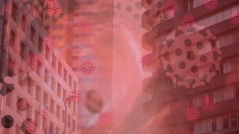 Animation-of-covid-19-cells-floating-over-cityscape-on-red-background