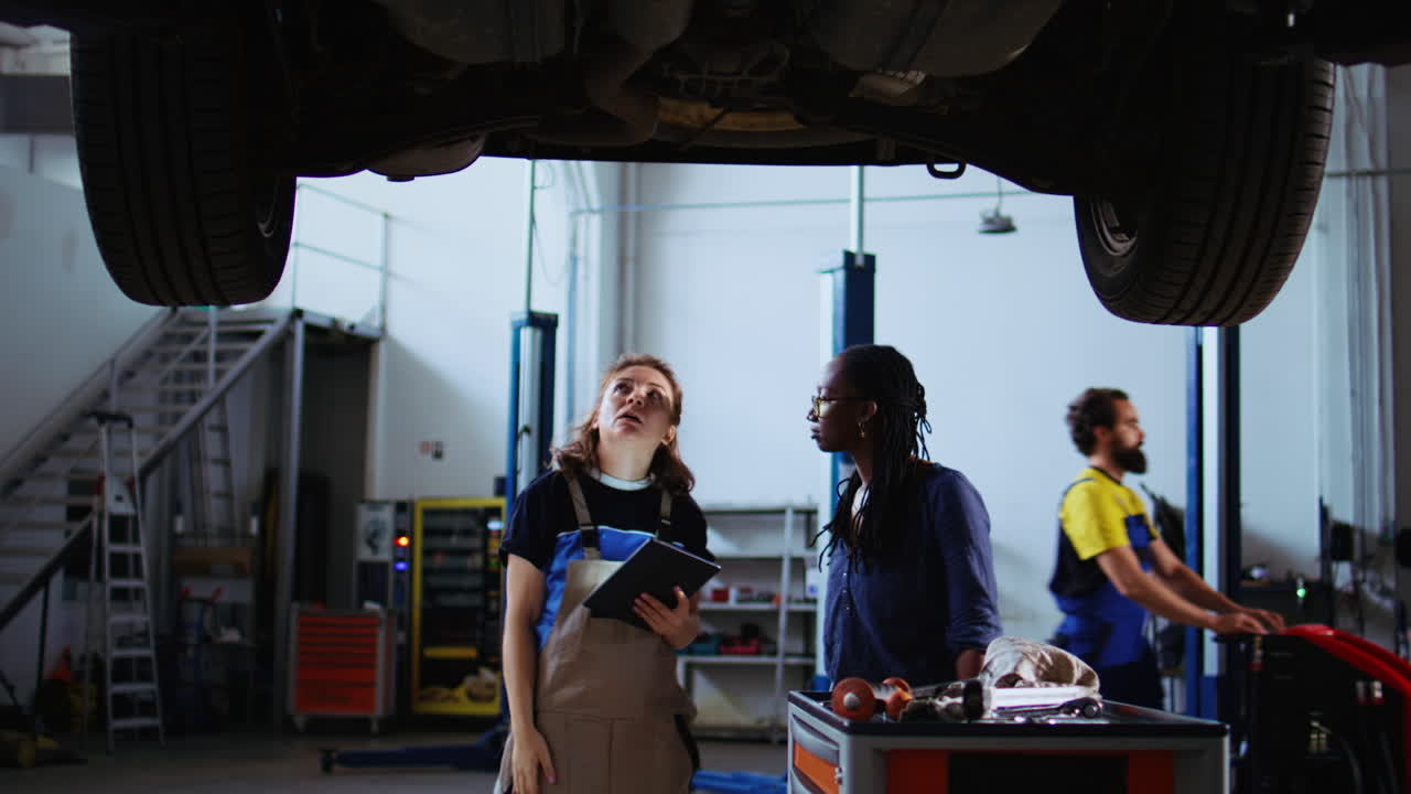 Employee looks online for vehicle parts