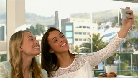 pretty girls taking a selfie