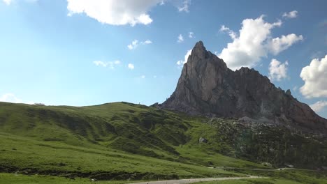 Beautiful-ountry-landscape,-green-fields-and-high-mountain-tops-at-Passo-di-Giau,-Dolomites,-Italy