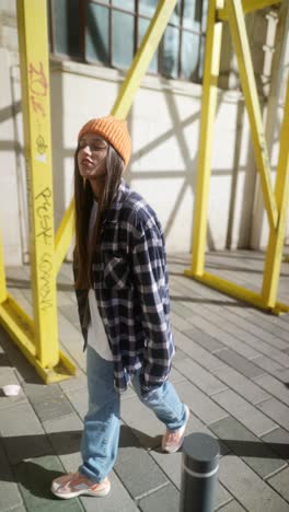 stylish young woman walking in the city