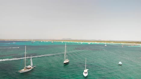 Spain,-Mallorca-Platja-des-Trenc-beach-a-beautiful-fly-by-over-the-beach-at-4k-24-fps-with-ND-filters-on-a-very-bright-day-with-a-DJI-Mavic-Air-drone