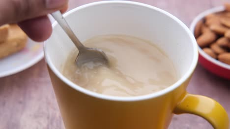 hot drink with almonds and biscuits