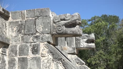 eagles and jaguars heads close up in chichen itza yucatan mexico