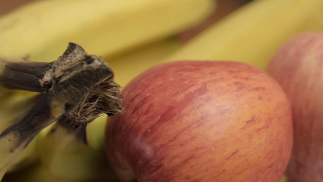 Apples and bananas isolated rotating shot