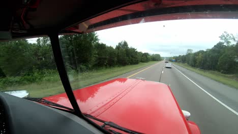 Cutaway-shot-out-the-front-window-showing-interstate-roadway