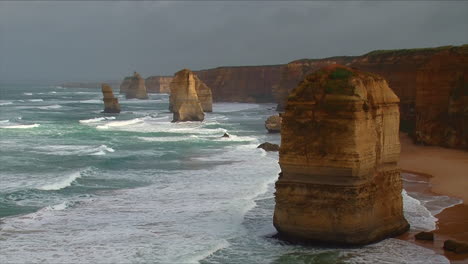 establishing shot of the 12 apostle rock formations along the great ocean road of victoria australia 2