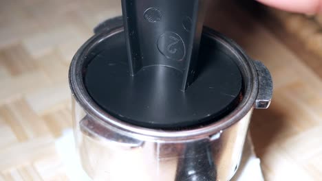 espresso tampering process
