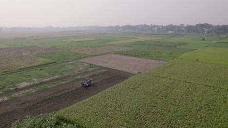 agricultural tractor working on a field