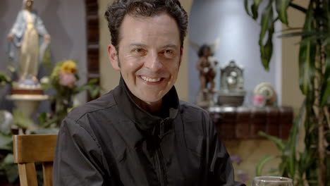 man having dinner in restaurant