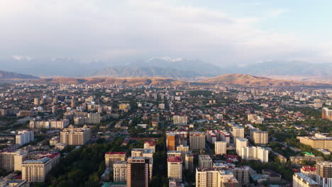 Panoramic View Over Bishkek In Kyrgyzstan At Sunrise - Drone Shot
