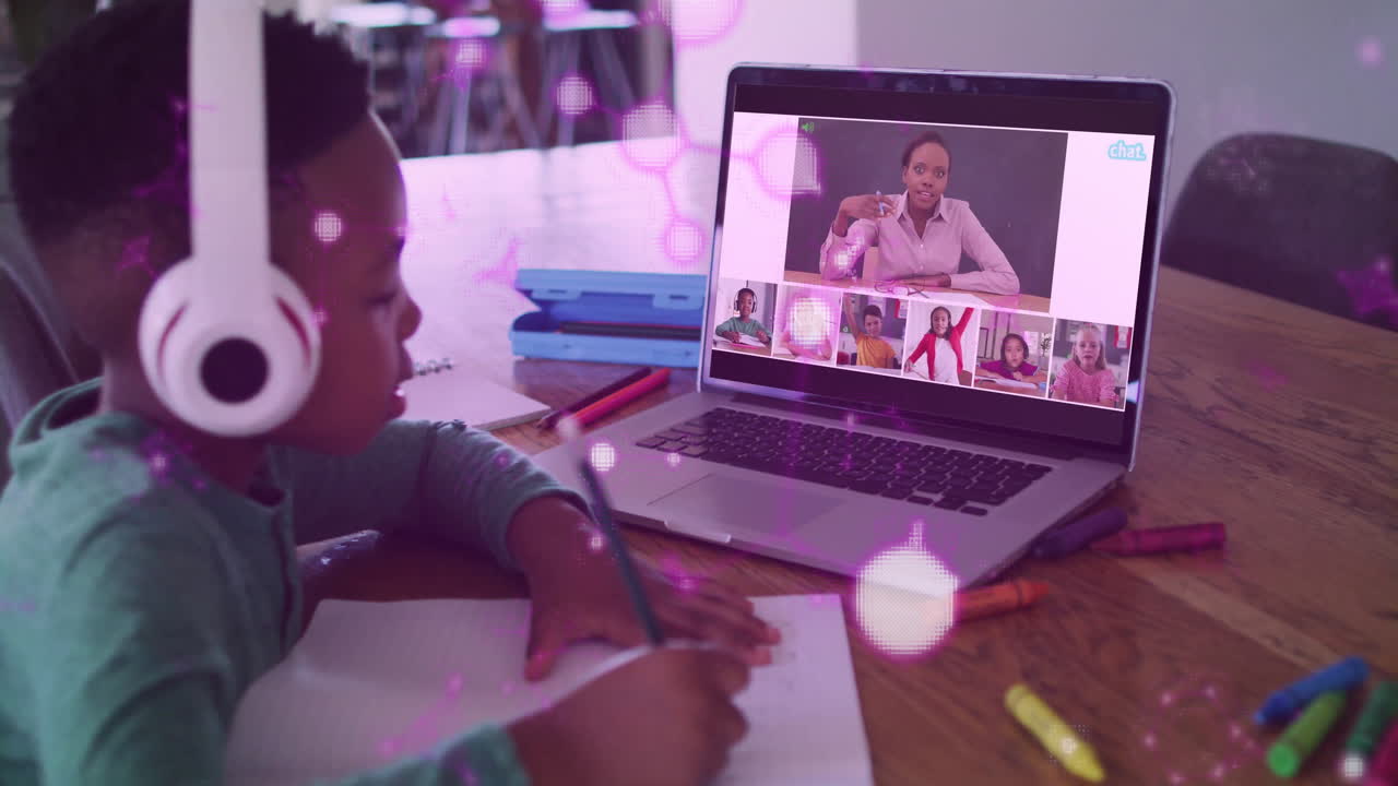In school, child wearing headphones participating in online class with animation