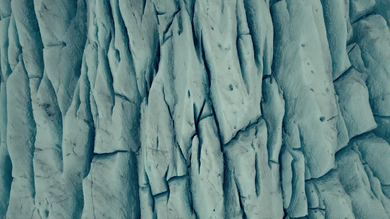 Abstract Aerial View of Glacier Ice and Crevasses