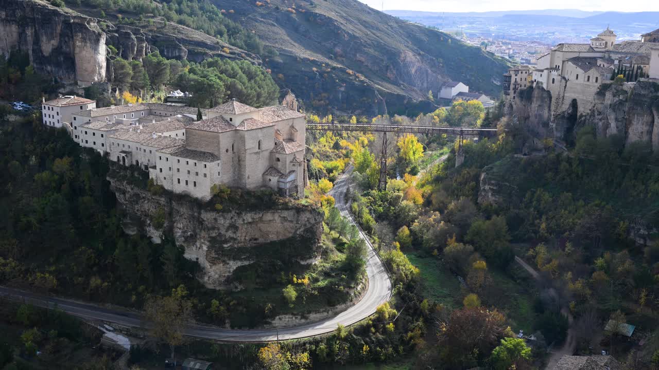 Two of the most famous landmarks in Cuenca, Spain, the Parador hotel and the Hanging Houses, face each other across the dramatic cliffside of the gorge.