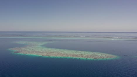 stunning aerial drone footage of the coral reef and lagoon in tahiti french polynesia