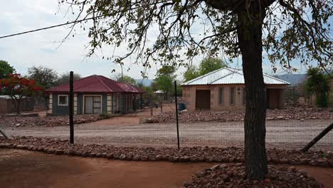 panorama of makushu village homes as taken from another african home in south africa