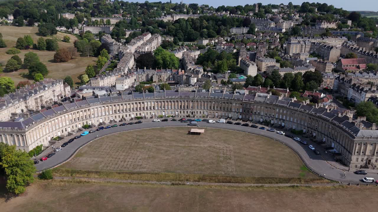 Aerial, wide view of Royal Crescent in Bath, UK on a summers day, central framing, ascending