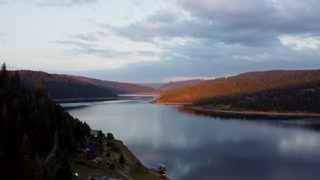 flying-the-drone-over-the-lake-at-sunset