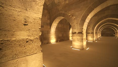 interior of historical monumental building with stone arches and domes