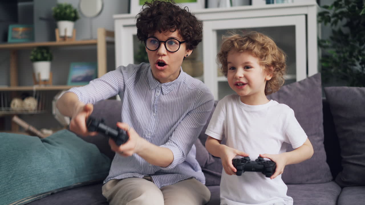 Mother and Son Playing Video Games Together