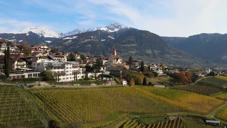 Aerial-Drone-Over-a-medieval-city-in-the-middle-of-the-Vineyards-in-Italy