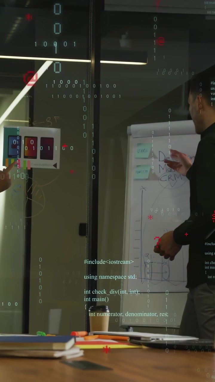 Vertical video: Lead pointing to color cards and flip chart, ranking tech tasks with code overlay