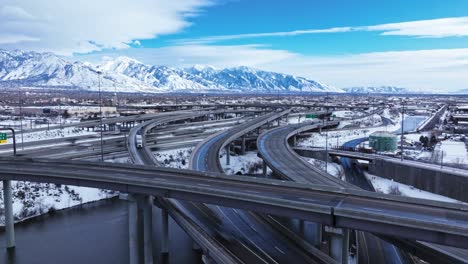 aerial hyperlapse show traffic flow at spaghetti bowl interchange in winter