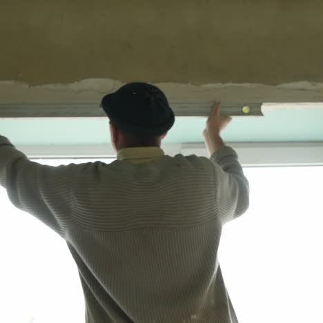 builder is working on new house construction