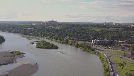 a muddy urban river in spring