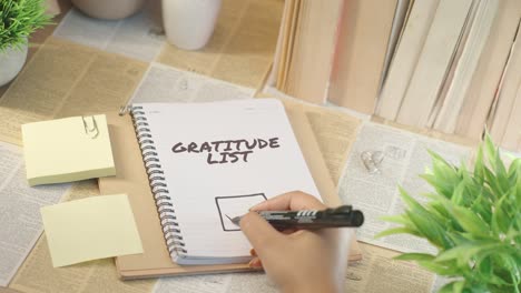 ticking off gratitude list from checklist