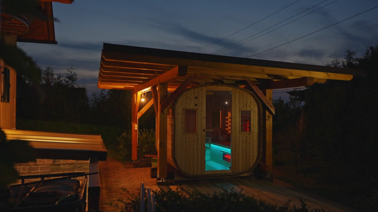 Stylish wooden sauna cabin with modern lighting, outdoor architecture detail