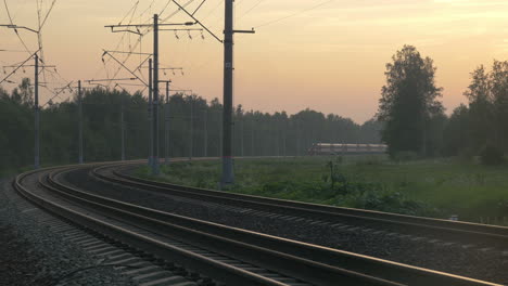 train turning and passing by outside the town