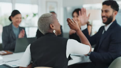 business team celebrating success in meeting