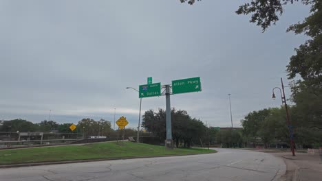 walking towards i-45 exit in houston, texas on a cloudy day