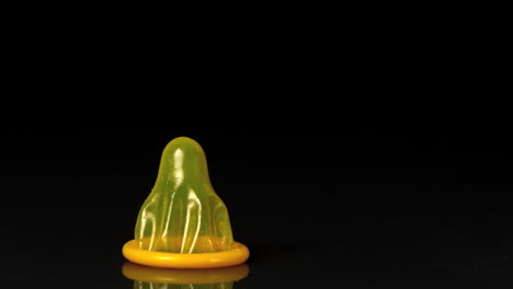 yellow condom dropping down