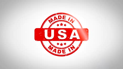 made in usa signed stamping text wooden stamp animation. red ink on clean white paper surface background with green matte background included.