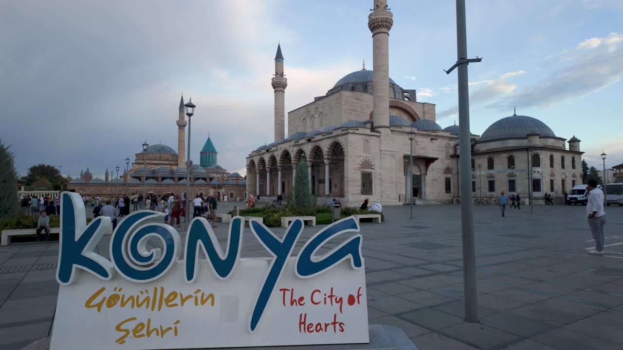 A serene view of the Selimiye Mosque in Konya at sunset, showcasing Turkish Islamic architecture with a peaceful ambiance
