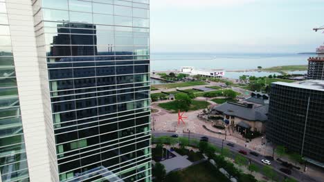 beautifully revealing michigan milwaukee lakefront behind a reflective building