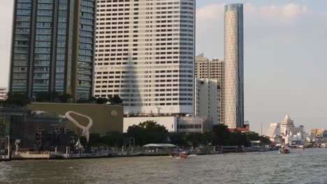 bangkok riverfront skyline with modern buildings