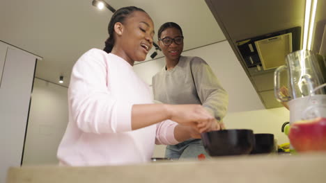 women preparing a salad