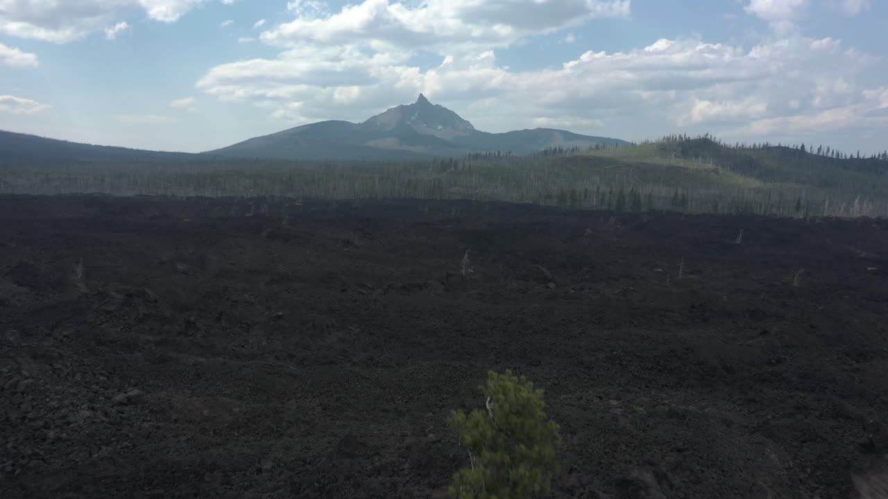 Aerial view of Mount Washington in Oregon with lava rock fields.