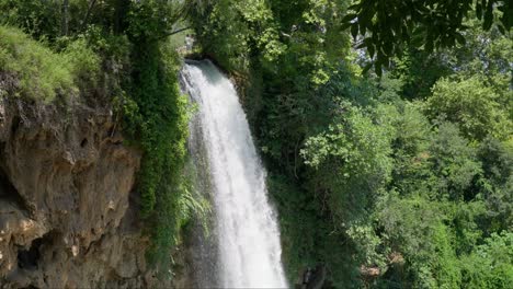 Calm-Slow-motion-Waterfall-summer-sunny-day-forest-national-park-cliff-no-people