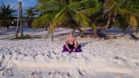 santa claus is enjoying summer holidays on a beautiful tropical beach. smooth aerial view flight speed ramp hyper motion time lapse